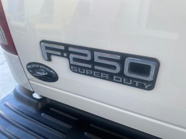2001 Oxford White /Medium Graphite Ford Super Duty F-250 XLT 7.3 TURBO DIESEL 4WD (3FTNX21F41M) with an 7.3L DI V8 Turbo-Diesel Power Stroke Engine engine, Automatic transmission, located at 4701 North Dixie Hwy, Pompano Beach, FL, 33064, (954) 422-2889, 26.240938, -80.123474 - OUR WEBPAGE FLORIDACARS1.COM HAS OVER 100 PHOTOS AND FREE CARFAX LINK 2001 FORD F-250 SUPER DUTY XLT TURBO DIESEL ENGINE 4WD VIN: 3FTNX21F41MA06821 3 F T N X 2 1 F 4 1 M A 0 6 8 2 1 4 DOOR EXTENDED CAB PICKUP 7.3L V8 F DIESEL REAR WHEEL DRIVE W/ 4X4 Features 4WD/AWD ABS Brakes Air Conditioning AM/FM - Photo#86