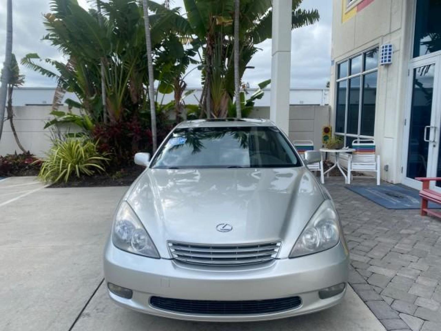 2004 Millennium Silver Metallic /Light Charcoal Lexus ES 330 LOW MILES 74,701 SUNROOF (JTHBA30G745) with an 3.3L DOHC EFI 24-Valve V6 Engine engine, Automatic transmission, located at 4701 North Dixie Hwy, Pompano Beach, FL, 33064, (954) 422-2889, 26.240938, -80.123474 - OUR WEBPAGE FLORIDACARS1.COM HAS OVER 100 PHOTOS AND FREE CARFAX LINK 2004 LEXUS ES 330 ORIGINAL PRICE NEW $32,384 VIN: JTHBA30G745034416 J T H B A 3 0 G 7 4 5 0 3 4 4 1 6 SEDAN 4 DR 3.3L V6 F 24V GASOLINE 29 MPG FRONT WHEEL DRIVE Features ABS Brakes Air Conditioning Alloy Wheels AM/FM Stereo Automa - Photo#2