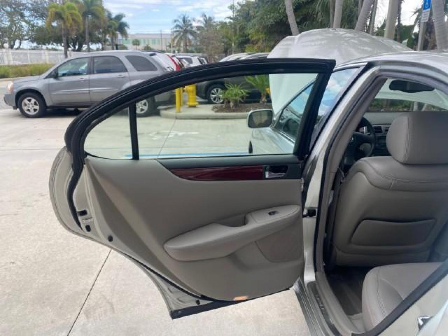 2004 Millennium Silver Metallic /Light Charcoal Lexus ES 330 LOW MILES 74,701 SUNROOF (JTHBA30G745) with an 3.3L DOHC EFI 24-Valve V6 Engine engine, Automatic transmission, located at 4701 North Dixie Hwy, Pompano Beach, FL, 33064, (954) 422-2889, 26.240938, -80.123474 - OUR WEBPAGE FLORIDACARS1.COM HAS OVER 100 PHOTOS AND FREE CARFAX LINK 2004 LEXUS ES 330 ORIGINAL PRICE NEW $32,384 VIN: JTHBA30G745034416 J T H B A 3 0 G 7 4 5 0 3 4 4 1 6 SEDAN 4 DR 3.3L V6 F 24V GASOLINE 29 MPG FRONT WHEEL DRIVE Features ABS Brakes Air Conditioning Alloy Wheels AM/FM Stereo Automa - Photo#13