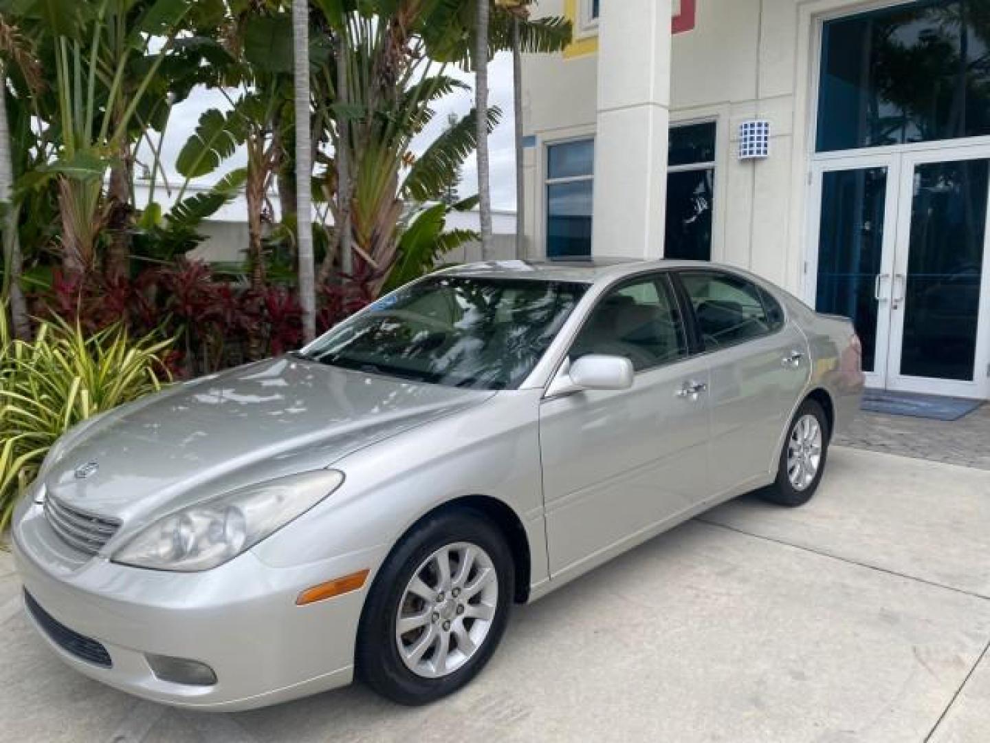 2004 Millennium Silver Metallic /Light Charcoal Lexus ES 330 LOW MILES 74,701 SUNROOF (JTHBA30G745) with an 3.3L DOHC EFI 24-Valve V6 Engine engine, Automatic transmission, located at 4701 North Dixie Hwy, Pompano Beach, FL, 33064, (954) 422-2889, 26.240938, -80.123474 - OUR WEBPAGE FLORIDACARS1.COM HAS OVER 100 PHOTOS AND FREE CARFAX LINK 2004 LEXUS ES 330 ORIGINAL PRICE NEW $32,384 VIN: JTHBA30G745034416 J T H B A 3 0 G 7 4 5 0 3 4 4 1 6 SEDAN 4 DR 3.3L V6 F 24V GASOLINE 29 MPG FRONT WHEEL DRIVE Features ABS Brakes Air Conditioning Alloy Wheels AM/FM Stereo Automa - Photo#29