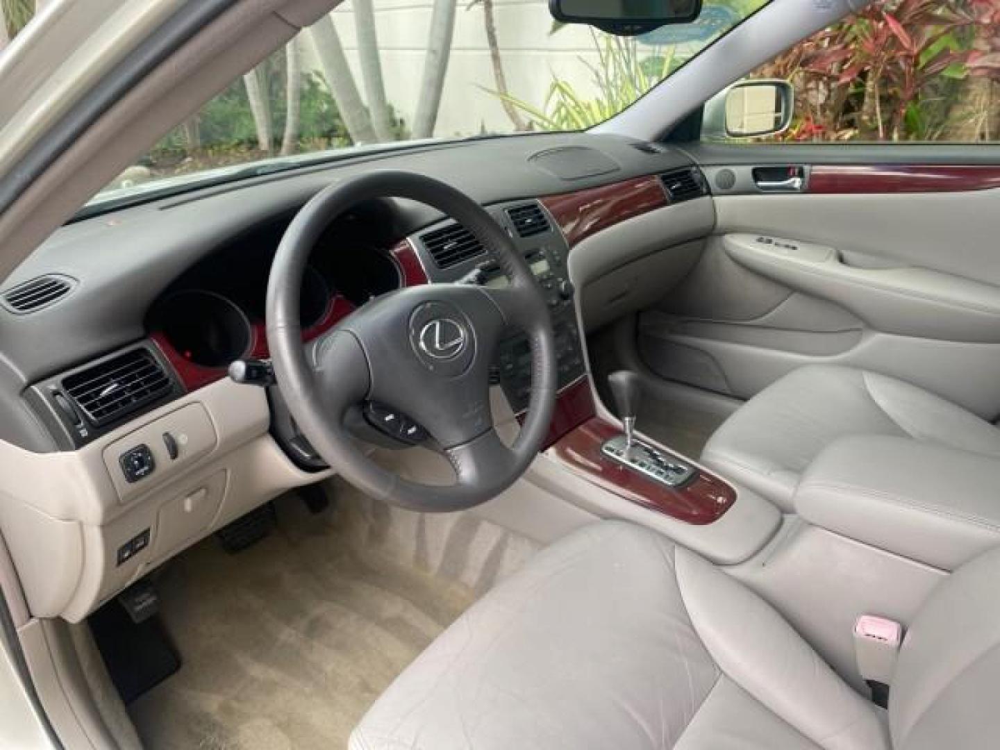 2004 Millennium Silver Metallic /Light Charcoal Lexus ES 330 LOW MILES 74,701 SUNROOF (JTHBA30G745) with an 3.3L DOHC EFI 24-Valve V6 Engine engine, Automatic transmission, located at 4701 North Dixie Hwy, Pompano Beach, FL, 33064, (954) 422-2889, 26.240938, -80.123474 - OUR WEBPAGE FLORIDACARS1.COM HAS OVER 100 PHOTOS AND FREE CARFAX LINK 2004 LEXUS ES 330 ORIGINAL PRICE NEW $32,384 VIN: JTHBA30G745034416 J T H B A 3 0 G 7 4 5 0 3 4 4 1 6 SEDAN 4 DR 3.3L V6 F 24V GASOLINE 29 MPG FRONT WHEEL DRIVE Features ABS Brakes Air Conditioning Alloy Wheels AM/FM Stereo Automa - Photo#45