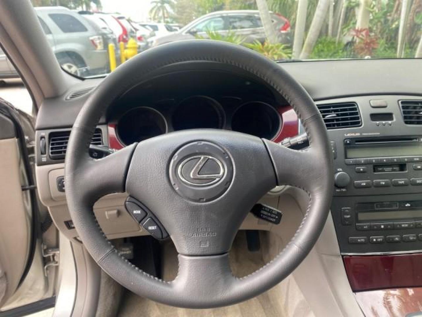 2004 Millennium Silver Metallic /Light Charcoal Lexus ES 330 LOW MILES 74,701 SUNROOF (JTHBA30G745) with an 3.3L DOHC EFI 24-Valve V6 Engine engine, Automatic transmission, located at 4701 North Dixie Hwy, Pompano Beach, FL, 33064, (954) 422-2889, 26.240938, -80.123474 - OUR WEBPAGE FLORIDACARS1.COM HAS OVER 100 PHOTOS AND FREE CARFAX LINK 2004 LEXUS ES 330 ORIGINAL PRICE NEW $32,384 VIN: JTHBA30G745034416 J T H B A 3 0 G 7 4 5 0 3 4 4 1 6 SEDAN 4 DR 3.3L V6 F 24V GASOLINE 29 MPG FRONT WHEEL DRIVE Features ABS Brakes Air Conditioning Alloy Wheels AM/FM Stereo Automa - Photo#47