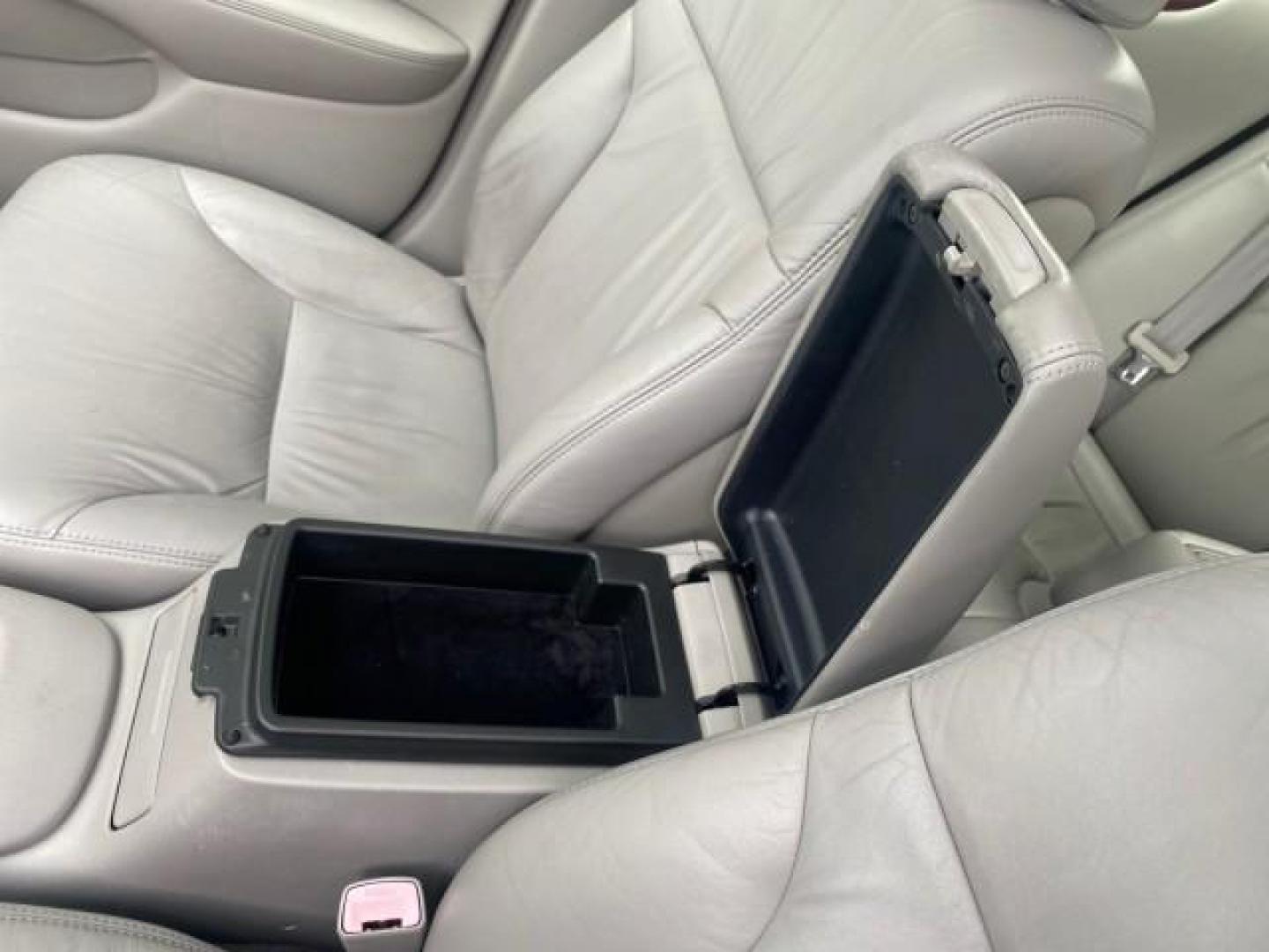 2004 Millennium Silver Metallic /Light Charcoal Lexus ES 330 LOW MILES 74,701 SUNROOF (JTHBA30G745) with an 3.3L DOHC EFI 24-Valve V6 Engine engine, Automatic transmission, located at 4701 North Dixie Hwy, Pompano Beach, FL, 33064, (954) 422-2889, 26.240938, -80.123474 - OUR WEBPAGE FLORIDACARS1.COM HAS OVER 100 PHOTOS AND FREE CARFAX LINK 2004 LEXUS ES 330 ORIGINAL PRICE NEW $32,384 VIN: JTHBA30G745034416 J T H B A 3 0 G 7 4 5 0 3 4 4 1 6 SEDAN 4 DR 3.3L V6 F 24V GASOLINE 29 MPG FRONT WHEEL DRIVE Features ABS Brakes Air Conditioning Alloy Wheels AM/FM Stereo Automa - Photo#59