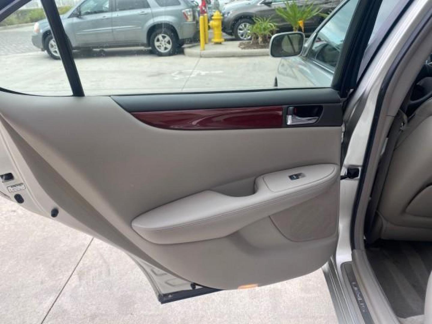 2004 Millennium Silver Metallic /Light Charcoal Lexus ES 330 LOW MILES 74,701 SUNROOF (JTHBA30G745) with an 3.3L DOHC EFI 24-Valve V6 Engine engine, Automatic transmission, located at 4701 North Dixie Hwy, Pompano Beach, FL, 33064, (954) 422-2889, 26.240938, -80.123474 - OUR WEBPAGE FLORIDACARS1.COM HAS OVER 100 PHOTOS AND FREE CARFAX LINK 2004 LEXUS ES 330 ORIGINAL PRICE NEW $32,384 VIN: JTHBA30G745034416 J T H B A 3 0 G 7 4 5 0 3 4 4 1 6 SEDAN 4 DR 3.3L V6 F 24V GASOLINE 29 MPG FRONT WHEEL DRIVE Features ABS Brakes Air Conditioning Alloy Wheels AM/FM Stereo Automa - Photo#72