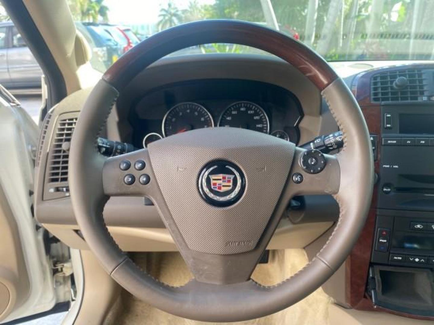 2006 White Diamond /Cashmere Cadillac CTS LOW MILES 39,799 1 OWNER SUNROOF (1G6DP577360) with an 3.6L V6 VVT Engine engine, Automatic transmission, located at 4701 North Dixie Hwy, Pompano Beach, FL, 33064, (954) 422-2889, 26.240938, -80.123474 - OUR WEBPAGE FLORIDACARS1.COM HAS OVER 100 PHOTOS AND FREE CARFAX LINK 2006 CADILLAC CTS 1 OWNER ORIGINAL PRICE NEW $33,170 VIN: 1G6DP577360107116 1 G 6 D P 5 7 7 3 6 0 1 0 7 1 1 6 SEDAN 4 DR 3.6L V6 F GASOLINE 27 MPG REAR WHEEL DRIVE Features ABS Brakes Air Conditioning Alloy Wheels AM/FM Stereo Aut - Photo#47