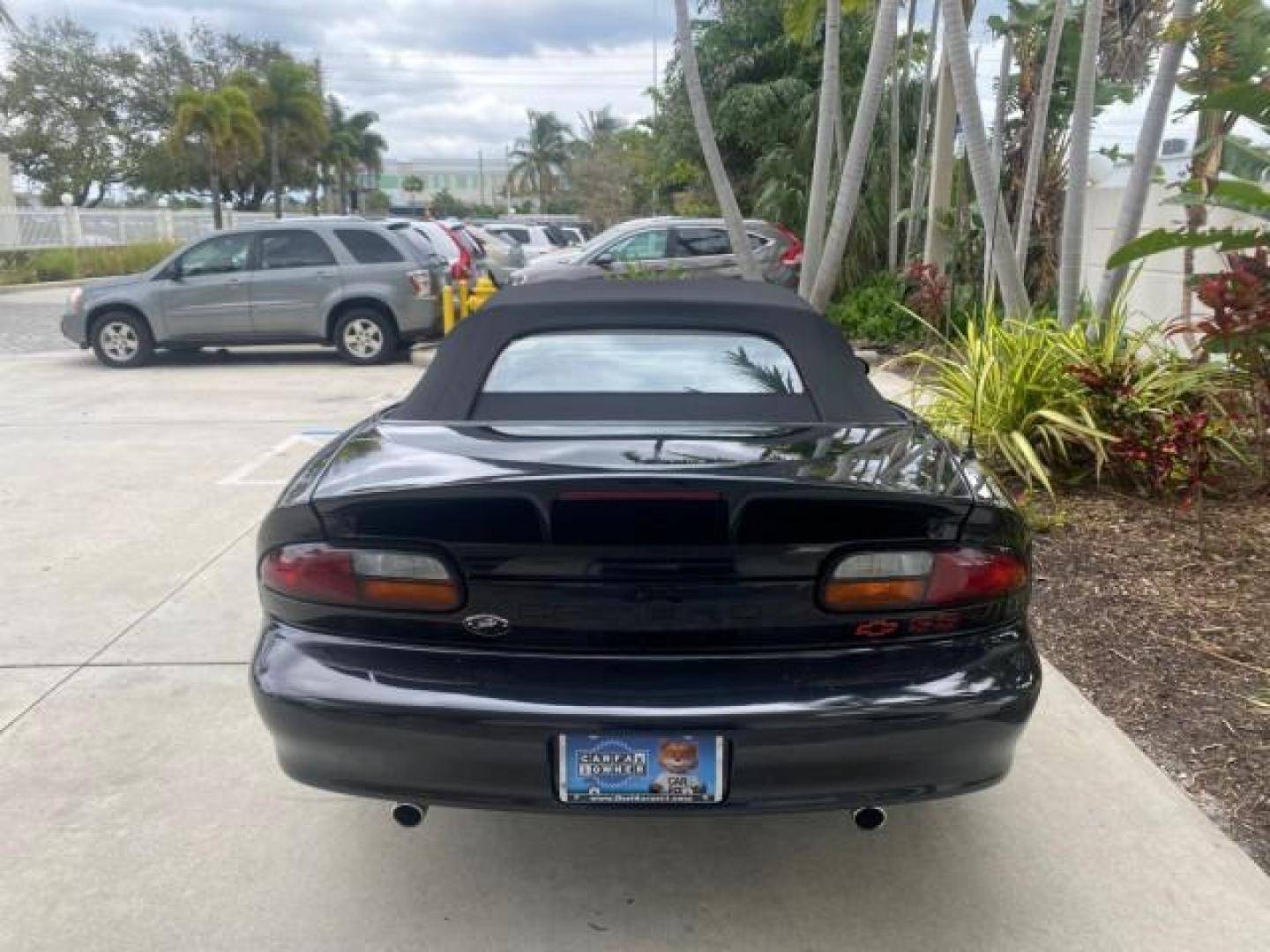 2002 Black /Ebony Chevrolet Camaro Z28 CONV 6 SPD LOW MILES 29,016 (2G1FP32G622) with an 5.7L SFI V8 Engine engine, Manual transmission, located at 4701 North Dixie Hwy, Pompano Beach, FL, 33064, (954) 422-2889, 26.240938, -80.123474 - OUR WEBPAGE FLORIDACARS1.COM HAS OVER 100 PHOTOS AND FREE CARFAX LINK 2002 CHEVROLET CAMARO Z28 6 SPEED ALL ORIGINAL PAINT VERY LOW MILES VIN: 2G1FP32G622129985 2 G 1 F P 3 2 G 6 2 2 1 2 9 9 8 5 CONVERTIBLE 5.7L V8 F OHV GASOLINE 25 MPG REAR WHEEL DRIVE Features ABS Brakes Air Conditioning Alloy Whe - Photo#6