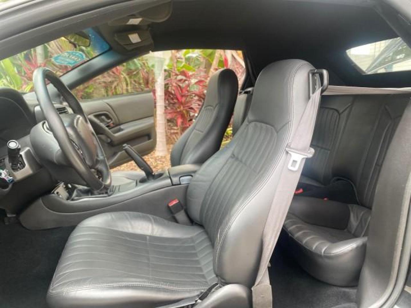 2002 Black /Ebony Chevrolet Camaro Z28 CONV 6 SPD LOW MILES 29,016 (2G1FP32G622) with an 5.7L SFI V8 Engine engine, Manual transmission, located at 4701 North Dixie Hwy, Pompano Beach, FL, 33064, (954) 422-2889, 26.240938, -80.123474 - OUR WEBPAGE FLORIDACARS1.COM HAS OVER 100 PHOTOS AND FREE CARFAX LINK 2002 CHEVROLET CAMARO Z28 6 SPEED ALL ORIGINAL PAINT VERY LOW MILES VIN: 2G1FP32G622129985 2 G 1 F P 3 2 G 6 2 2 1 2 9 9 8 5 CONVERTIBLE 5.7L V8 F OHV GASOLINE 25 MPG REAR WHEEL DRIVE Features ABS Brakes Air Conditioning Alloy Whe - Photo#10