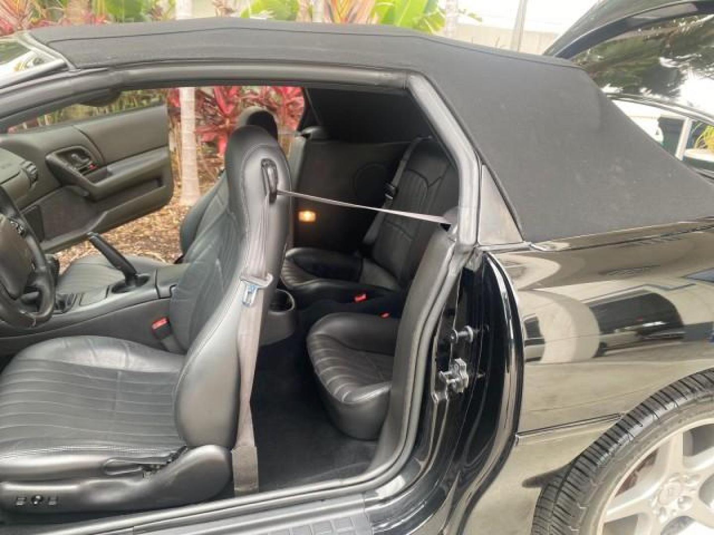 2002 Black /Ebony Chevrolet Camaro Z28 CONV 6 SPD LOW MILES 29,016 (2G1FP32G622) with an 5.7L SFI V8 Engine engine, Manual transmission, located at 4701 North Dixie Hwy, Pompano Beach, FL, 33064, (954) 422-2889, 26.240938, -80.123474 - OUR WEBPAGE FLORIDACARS1.COM HAS OVER 100 PHOTOS AND FREE CARFAX LINK 2002 CHEVROLET CAMARO Z28 6 SPEED ALL ORIGINAL PAINT VERY LOW MILES VIN: 2G1FP32G622129985 2 G 1 F P 3 2 G 6 2 2 1 2 9 9 8 5 CONVERTIBLE 5.7L V8 F OHV GASOLINE 25 MPG REAR WHEEL DRIVE Features ABS Brakes Air Conditioning Alloy Whe - Photo#13