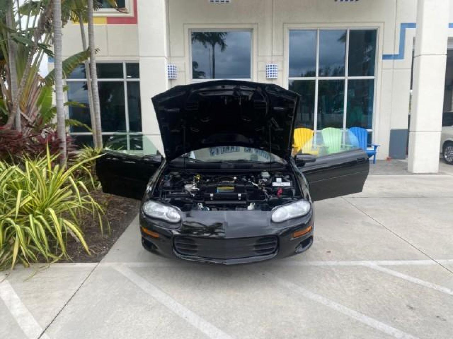 2002 Black /Ebony Chevrolet Camaro Z28 CONV 6 SPD LOW MILES 29,016 (2G1FP32G622) with an 5.7L SFI V8 Engine engine, Manual transmission, located at 4701 North Dixie Hwy, Pompano Beach, FL, 33064, (954) 422-2889, 26.240938, -80.123474 - OUR WEBPAGE FLORIDACARS1.COM HAS OVER 100 PHOTOS AND FREE CARFAX LINK 2002 CHEVROLET CAMARO Z28 6 SPEED ALL ORIGINAL PAINT VERY LOW MILES VIN: 2G1FP32G622129985 2 G 1 F P 3 2 G 6 2 2 1 2 9 9 8 5 CONVERTIBLE 5.7L V8 F OHV GASOLINE 25 MPG REAR WHEEL DRIVE Features ABS Brakes Air Conditioning Alloy Whe - Photo#16