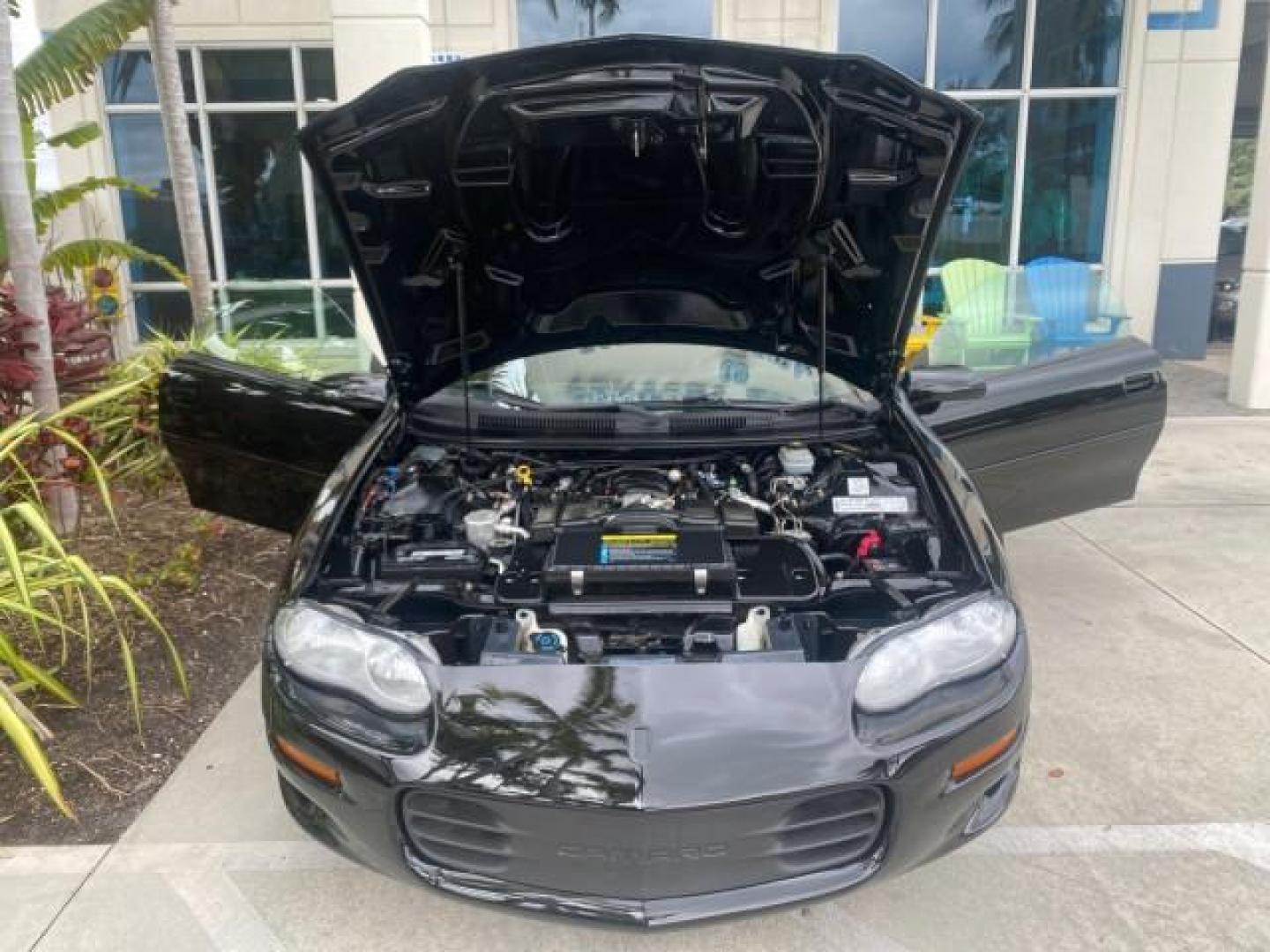 2002 Black /Ebony Chevrolet Camaro Z28 CONV 6 SPD LOW MILES 29,016 (2G1FP32G622) with an 5.7L SFI V8 Engine engine, Manual transmission, located at 4701 North Dixie Hwy, Pompano Beach, FL, 33064, (954) 422-2889, 26.240938, -80.123474 - OUR WEBPAGE FLORIDACARS1.COM HAS OVER 100 PHOTOS AND FREE CARFAX LINK 2002 CHEVROLET CAMARO Z28 6 SPEED ALL ORIGINAL PAINT VERY LOW MILES VIN: 2G1FP32G622129985 2 G 1 F P 3 2 G 6 2 2 1 2 9 9 8 5 CONVERTIBLE 5.7L V8 F OHV GASOLINE 25 MPG REAR WHEEL DRIVE Features ABS Brakes Air Conditioning Alloy Whe - Photo#17