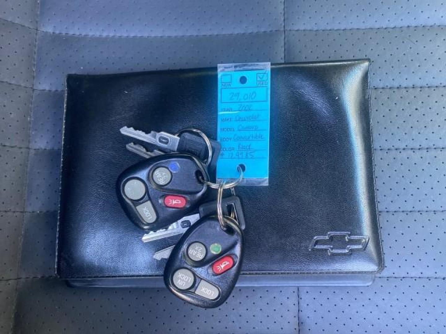 2002 Black /Ebony Chevrolet Camaro Z28 CONV 6 SPD LOW MILES 29,016 (2G1FP32G622) with an 5.7L SFI V8 Engine engine, Manual transmission, located at 4701 North Dixie Hwy, Pompano Beach, FL, 33064, (954) 422-2889, 26.240938, -80.123474 - OUR WEBPAGE FLORIDACARS1.COM HAS OVER 100 PHOTOS AND FREE CARFAX LINK 2002 CHEVROLET CAMARO Z28 6 SPEED ALL ORIGINAL PAINT VERY LOW MILES VIN: 2G1FP32G622129985 2 G 1 F P 3 2 G 6 2 2 1 2 9 9 8 5 CONVERTIBLE 5.7L V8 F OHV GASOLINE 25 MPG REAR WHEEL DRIVE Features ABS Brakes Air Conditioning Alloy Whe - Photo#23