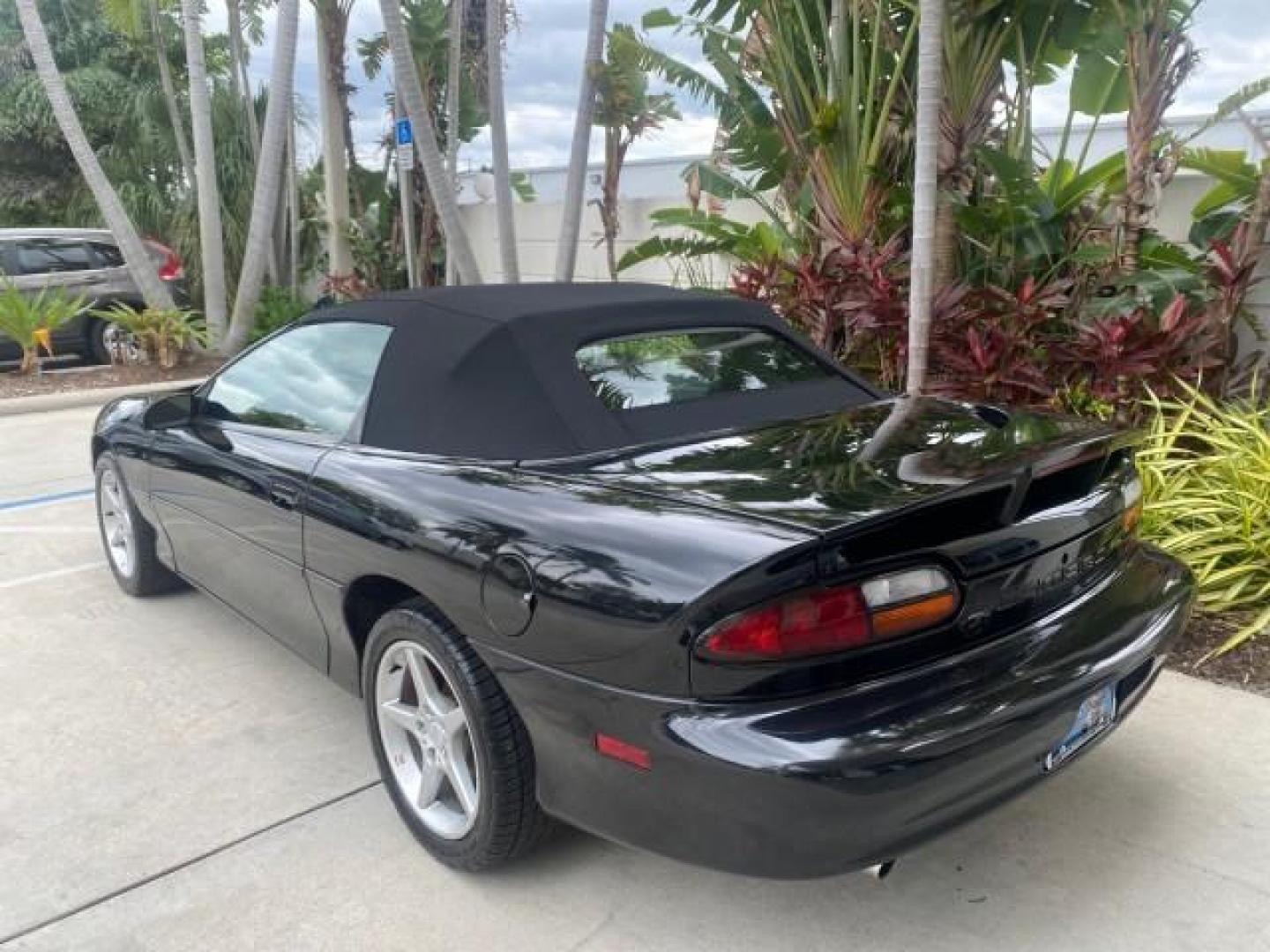 2002 Black /Ebony Chevrolet Camaro Z28 CONV 6 SPD LOW MILES 29,016 (2G1FP32G622) with an 5.7L SFI V8 Engine engine, Manual transmission, located at 4701 North Dixie Hwy, Pompano Beach, FL, 33064, (954) 422-2889, 26.240938, -80.123474 - OUR WEBPAGE FLORIDACARS1.COM HAS OVER 100 PHOTOS AND FREE CARFAX LINK 2002 CHEVROLET CAMARO Z28 6 SPEED ALL ORIGINAL PAINT VERY LOW MILES VIN: 2G1FP32G622129985 2 G 1 F P 3 2 G 6 2 2 1 2 9 9 8 5 CONVERTIBLE 5.7L V8 F OHV GASOLINE 25 MPG REAR WHEEL DRIVE Features ABS Brakes Air Conditioning Alloy Whe - Photo#41
