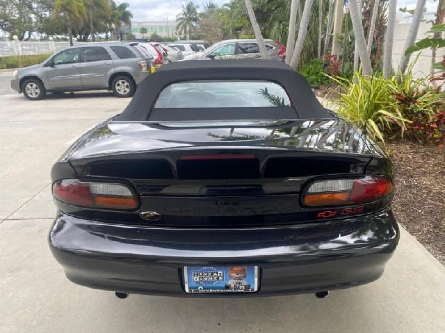 2002 Black /Ebony Chevrolet Camaro Z28 CONV 6 SPD LOW MILES 29,016 (2G1FP32G622) with an 5.7L SFI V8 Engine engine, Manual transmission, located at 4701 North Dixie Hwy, Pompano Beach, FL, 33064, (954) 422-2889, 26.240938, -80.123474 - OUR WEBPAGE FLORIDACARS1.COM HAS OVER 100 PHOTOS AND FREE CARFAX LINK 2002 CHEVROLET CAMARO Z28 6 SPEED ALL ORIGINAL PAINT VERY LOW MILES VIN: 2G1FP32G622129985 2 G 1 F P 3 2 G 6 2 2 1 2 9 9 8 5 CONVERTIBLE 5.7L V8 F OHV GASOLINE 25 MPG REAR WHEEL DRIVE Features ABS Brakes Air Conditioning Alloy Whe - Photo#44