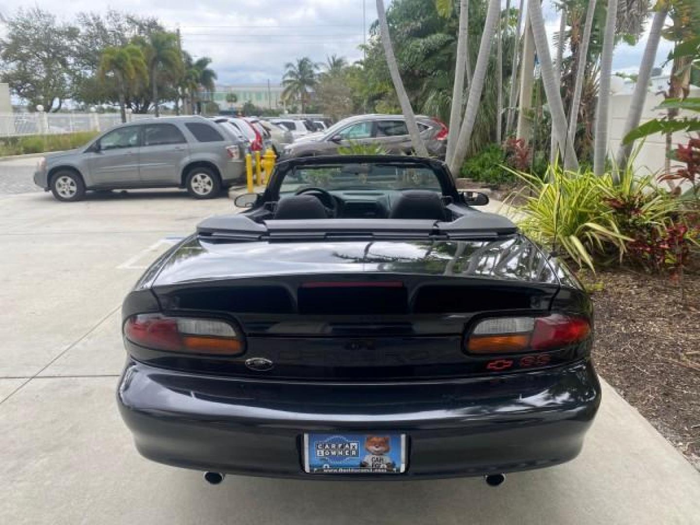 2002 Black /Ebony Chevrolet Camaro Z28 CONV 6 SPD LOW MILES 29,016 (2G1FP32G622) with an 5.7L SFI V8 Engine engine, Manual transmission, located at 4701 North Dixie Hwy, Pompano Beach, FL, 33064, (954) 422-2889, 26.240938, -80.123474 - OUR WEBPAGE FLORIDACARS1.COM HAS OVER 100 PHOTOS AND FREE CARFAX LINK 2002 CHEVROLET CAMARO Z28 6 SPEED ALL ORIGINAL PAINT VERY LOW MILES VIN: 2G1FP32G622129985 2 G 1 F P 3 2 G 6 2 2 1 2 9 9 8 5 CONVERTIBLE 5.7L V8 F OHV GASOLINE 25 MPG REAR WHEEL DRIVE Features ABS Brakes Air Conditioning Alloy Whe - Photo#45