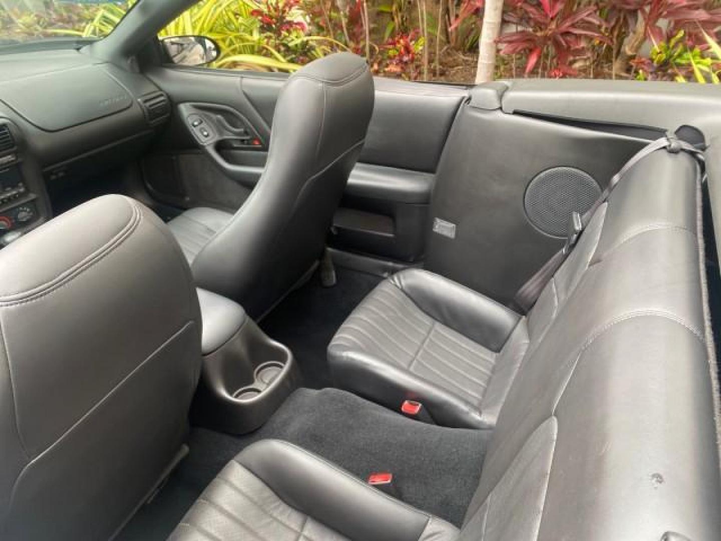 2002 Black /Ebony Chevrolet Camaro Z28 CONV 6 SPD LOW MILES 29,016 (2G1FP32G622) with an 5.7L SFI V8 Engine engine, Manual transmission, located at 4701 North Dixie Hwy, Pompano Beach, FL, 33064, (954) 422-2889, 26.240938, -80.123474 - OUR WEBPAGE FLORIDACARS1.COM HAS OVER 100 PHOTOS AND FREE CARFAX LINK 2002 CHEVROLET CAMARO Z28 6 SPEED ALL ORIGINAL PAINT VERY LOW MILES VIN: 2G1FP32G622129985 2 G 1 F P 3 2 G 6 2 2 1 2 9 9 8 5 CONVERTIBLE 5.7L V8 F OHV GASOLINE 25 MPG REAR WHEEL DRIVE Features ABS Brakes Air Conditioning Alloy Whe - Photo#47