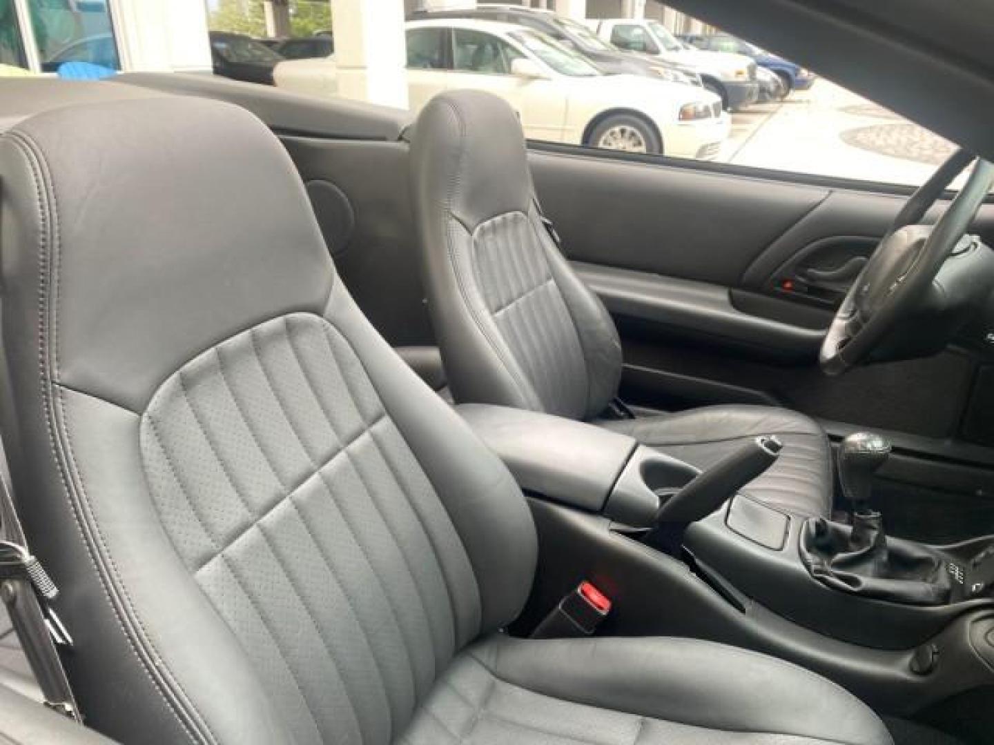 2002 Black /Ebony Chevrolet Camaro Z28 CONV 6 SPD LOW MILES 29,016 (2G1FP32G622) with an 5.7L SFI V8 Engine engine, Manual transmission, located at 4701 North Dixie Hwy, Pompano Beach, FL, 33064, (954) 422-2889, 26.240938, -80.123474 - OUR WEBPAGE FLORIDACARS1.COM HAS OVER 100 PHOTOS AND FREE CARFAX LINK 2002 CHEVROLET CAMARO Z28 6 SPEED ALL ORIGINAL PAINT VERY LOW MILES VIN: 2G1FP32G622129985 2 G 1 F P 3 2 G 6 2 2 1 2 9 9 8 5 CONVERTIBLE 5.7L V8 F OHV GASOLINE 25 MPG REAR WHEEL DRIVE Features ABS Brakes Air Conditioning Alloy Whe - Photo#51