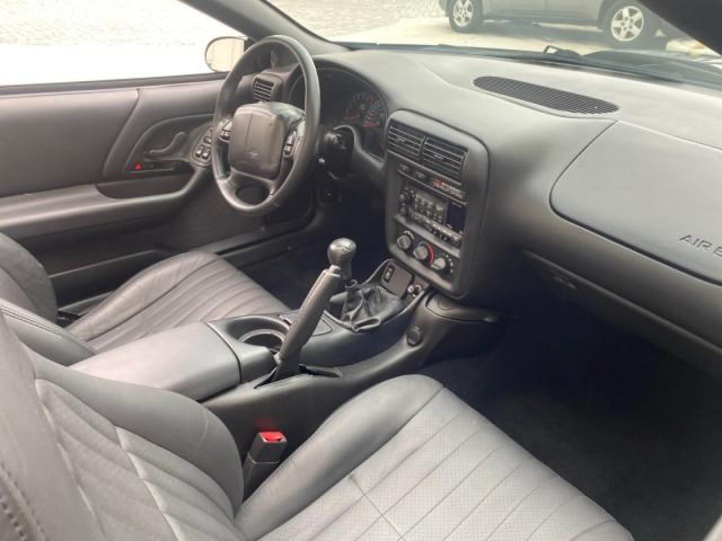 2002 Black /Ebony Chevrolet Camaro Z28 CONV 6 SPD LOW MILES 29,016 (2G1FP32G622) with an 5.7L SFI V8 Engine engine, Manual transmission, located at 4701 North Dixie Hwy, Pompano Beach, FL, 33064, (954) 422-2889, 26.240938, -80.123474 - OUR WEBPAGE FLORIDACARS1.COM HAS OVER 100 PHOTOS AND FREE CARFAX LINK 2002 CHEVROLET CAMARO Z28 6 SPEED ALL ORIGINAL PAINT VERY LOW MILES VIN: 2G1FP32G622129985 2 G 1 F P 3 2 G 6 2 2 1 2 9 9 8 5 CONVERTIBLE 5.7L V8 F OHV GASOLINE 25 MPG REAR WHEEL DRIVE Features ABS Brakes Air Conditioning Alloy Whe - Photo#52