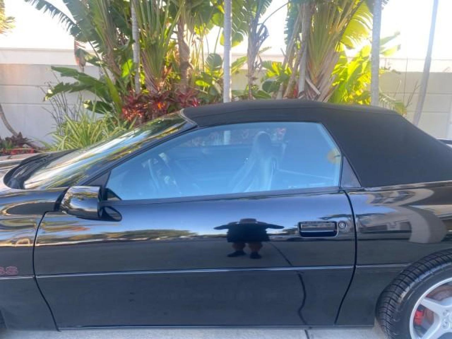 2002 Black /Ebony Chevrolet Camaro Z28 CONV 6 SPD LOW MILES 29,016 (2G1FP32G622) with an 5.7L SFI V8 Engine engine, Manual transmission, located at 4701 North Dixie Hwy, Pompano Beach, FL, 33064, (954) 422-2889, 26.240938, -80.123474 - OUR WEBPAGE FLORIDACARS1.COM HAS OVER 100 PHOTOS AND FREE CARFAX LINK 2002 CHEVROLET CAMARO Z28 6 SPEED ALL ORIGINAL PAINT VERY LOW MILES VIN: 2G1FP32G622129985 2 G 1 F P 3 2 G 6 2 2 1 2 9 9 8 5 CONVERTIBLE 5.7L V8 F OHV GASOLINE 25 MPG REAR WHEEL DRIVE Features ABS Brakes Air Conditioning Alloy Whe - Photo#56