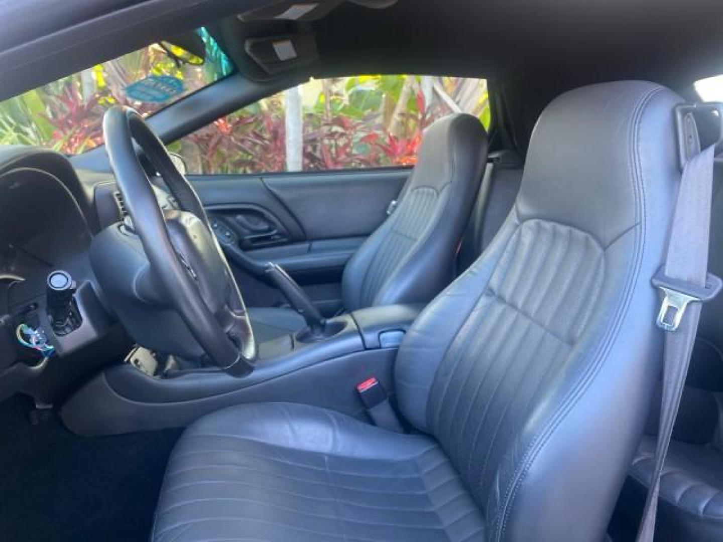 2002 Black /Ebony Chevrolet Camaro Z28 CONV 6 SPD LOW MILES 29,016 (2G1FP32G622) with an 5.7L SFI V8 Engine engine, Manual transmission, located at 4701 North Dixie Hwy, Pompano Beach, FL, 33064, (954) 422-2889, 26.240938, -80.123474 - OUR WEBPAGE FLORIDACARS1.COM HAS OVER 100 PHOTOS AND FREE CARFAX LINK 2002 CHEVROLET CAMARO Z28 6 SPEED ALL ORIGINAL PAINT VERY LOW MILES VIN: 2G1FP32G622129985 2 G 1 F P 3 2 G 6 2 2 1 2 9 9 8 5 CONVERTIBLE 5.7L V8 F OHV GASOLINE 25 MPG REAR WHEEL DRIVE Features ABS Brakes Air Conditioning Alloy Whe - Photo#62