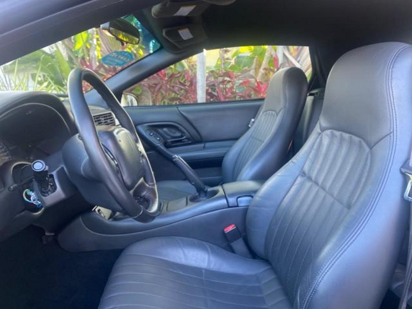 2002 Black /Ebony Chevrolet Camaro Z28 CONV 6 SPD LOW MILES 29,016 (2G1FP32G622) with an 5.7L SFI V8 Engine engine, Manual transmission, located at 4701 North Dixie Hwy, Pompano Beach, FL, 33064, (954) 422-2889, 26.240938, -80.123474 - OUR WEBPAGE FLORIDACARS1.COM HAS OVER 100 PHOTOS AND FREE CARFAX LINK 2002 CHEVROLET CAMARO Z28 6 SPEED ALL ORIGINAL PAINT VERY LOW MILES VIN: 2G1FP32G622129985 2 G 1 F P 3 2 G 6 2 2 1 2 9 9 8 5 CONVERTIBLE 5.7L V8 F OHV GASOLINE 25 MPG REAR WHEEL DRIVE Features ABS Brakes Air Conditioning Alloy Whe - Photo#63