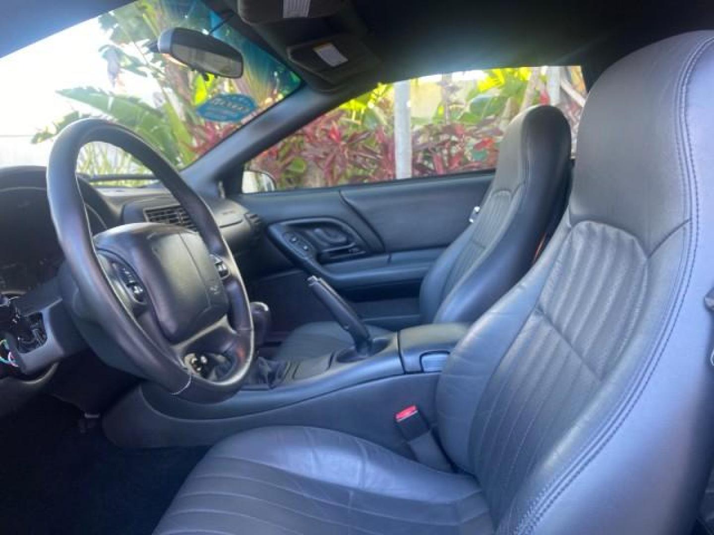 2002 Black /Ebony Chevrolet Camaro Z28 CONV 6 SPD LOW MILES 29,016 (2G1FP32G622) with an 5.7L SFI V8 Engine engine, Manual transmission, located at 4701 North Dixie Hwy, Pompano Beach, FL, 33064, (954) 422-2889, 26.240938, -80.123474 - OUR WEBPAGE FLORIDACARS1.COM HAS OVER 100 PHOTOS AND FREE CARFAX LINK 2002 CHEVROLET CAMARO Z28 6 SPEED ALL ORIGINAL PAINT VERY LOW MILES VIN: 2G1FP32G622129985 2 G 1 F P 3 2 G 6 2 2 1 2 9 9 8 5 CONVERTIBLE 5.7L V8 F OHV GASOLINE 25 MPG REAR WHEEL DRIVE Features ABS Brakes Air Conditioning Alloy Whe - Photo#64