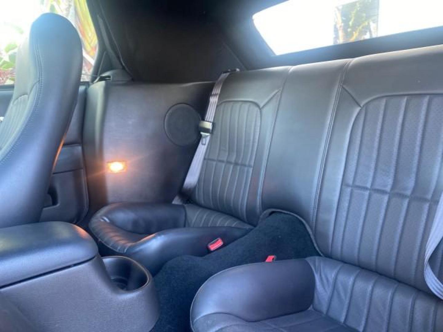 2002 Black /Ebony Chevrolet Camaro Z28 CONV 6 SPD LOW MILES 29,016 (2G1FP32G622) with an 5.7L SFI V8 Engine engine, Manual transmission, located at 4701 North Dixie Hwy, Pompano Beach, FL, 33064, (954) 422-2889, 26.240938, -80.123474 - OUR WEBPAGE FLORIDACARS1.COM HAS OVER 100 PHOTOS AND FREE CARFAX LINK 2002 CHEVROLET CAMARO Z28 6 SPEED ALL ORIGINAL PAINT VERY LOW MILES VIN: 2G1FP32G622129985 2 G 1 F P 3 2 G 6 2 2 1 2 9 9 8 5 CONVERTIBLE 5.7L V8 F OHV GASOLINE 25 MPG REAR WHEEL DRIVE Features ABS Brakes Air Conditioning Alloy Whe - Photo#92