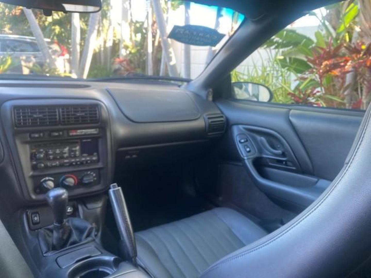 2002 Black /Ebony Chevrolet Camaro Z28 CONV 6 SPD LOW MILES 29,016 (2G1FP32G622) with an 5.7L SFI V8 Engine engine, Manual transmission, located at 4701 North Dixie Hwy, Pompano Beach, FL, 33064, (954) 422-2889, 26.240938, -80.123474 - OUR WEBPAGE FLORIDACARS1.COM HAS OVER 100 PHOTOS AND FREE CARFAX LINK 2002 CHEVROLET CAMARO Z28 6 SPEED ALL ORIGINAL PAINT VERY LOW MILES VIN: 2G1FP32G622129985 2 G 1 F P 3 2 G 6 2 2 1 2 9 9 8 5 CONVERTIBLE 5.7L V8 F OHV GASOLINE 25 MPG REAR WHEEL DRIVE Features ABS Brakes Air Conditioning Alloy Whe - Photo#94