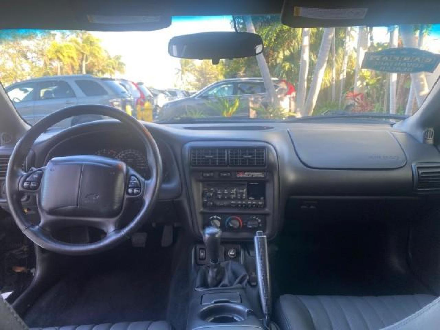 2002 Black /Ebony Chevrolet Camaro Z28 CONV 6 SPD LOW MILES 29,016 (2G1FP32G622) with an 5.7L SFI V8 Engine engine, Manual transmission, located at 4701 North Dixie Hwy, Pompano Beach, FL, 33064, (954) 422-2889, 26.240938, -80.123474 - OUR WEBPAGE FLORIDACARS1.COM HAS OVER 100 PHOTOS AND FREE CARFAX LINK 2002 CHEVROLET CAMARO Z28 6 SPEED ALL ORIGINAL PAINT VERY LOW MILES VIN: 2G1FP32G622129985 2 G 1 F P 3 2 G 6 2 2 1 2 9 9 8 5 CONVERTIBLE 5.7L V8 F OHV GASOLINE 25 MPG REAR WHEEL DRIVE Features ABS Brakes Air Conditioning Alloy Whe - Photo#95