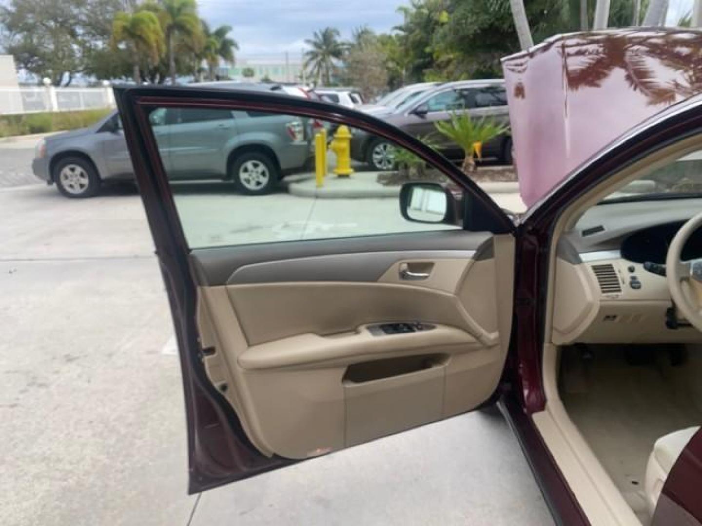 2008 Cassis Pearl /Ivory Toyota Avalon XL 1 OWNER LOW MILES 77,161 FL (4T1BK36B28U) with an 3.5L DOHC EFI 24-Valve V6 Engine engine, Automatic transmission, located at 4701 North Dixie Hwy, Pompano Beach, FL, 33064, (954) 422-2889, 26.240938, -80.123474 - OUR WEBPAGE FLORIDACARS1.COM HAS OVER 100 PHOTOS AND FREE CARFAX LINK 2008 TOYOTA AVALON TOURING 1 OWNER TIRES ARE LIKE NEW NON SMOKER CLOTH VIN: 4T1BK36B28U286740 4 T 1 B K 3 6 B 2 8 U 2 8 6 7 4 0 SEDAN 4 DR 3.5L V6 F DOHC 24V GASOLINE 28 MPG FRONT WHEEL DRIVE Features ABS Brakes Air Conditioning A - Photo#9