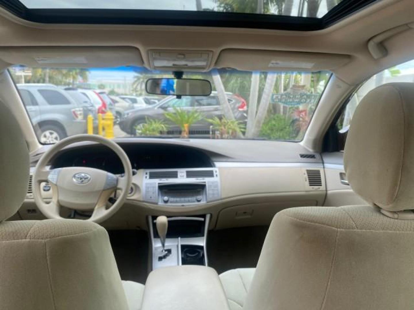 2008 Cassis Pearl /Ivory Toyota Avalon XL 1 OWNER LOW MILES 77,161 FL (4T1BK36B28U) with an 3.5L DOHC EFI 24-Valve V6 Engine engine, Automatic transmission, located at 4701 North Dixie Hwy, Pompano Beach, FL, 33064, (954) 422-2889, 26.240938, -80.123474 - OUR WEBPAGE FLORIDACARS1.COM HAS OVER 100 PHOTOS AND FREE CARFAX LINK 2008 TOYOTA AVALON TOURING 1 OWNER TIRES ARE LIKE NEW NON SMOKER CLOTH VIN: 4T1BK36B28U286740 4 T 1 B K 3 6 B 2 8 U 2 8 6 7 4 0 SEDAN 4 DR 3.5L V6 F DOHC 24V GASOLINE 28 MPG FRONT WHEEL DRIVE Features ABS Brakes Air Conditioning A - Photo#84