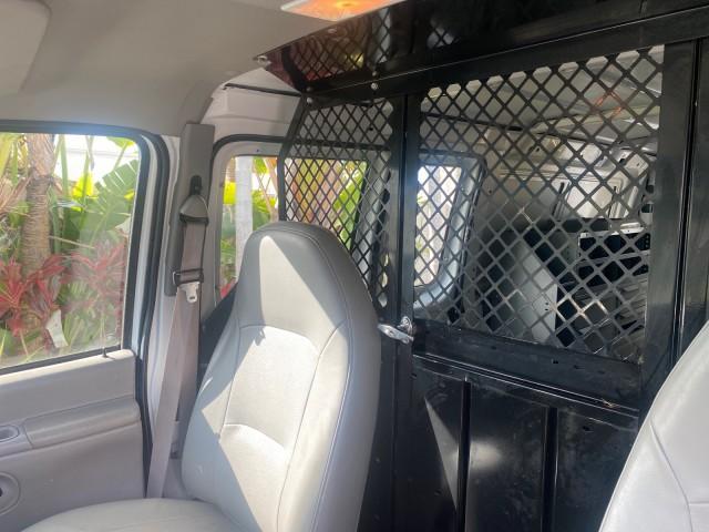 2000 Oxford White /Medium Graphite Ford Econoline Cargo Van LOW MILES 68,046 (1FTRE1426YH) with an 4.2L SEFI SPI V6 Engine engine, Automatic transmission, located at 4701 North Dixie Hwy, Pompano Beach, FL, 33064, (954) 422-2889, 26.240938, -80.123474 - OUR WEBPAGE FLORIDACARS1.COM HAS OVER 100 PHOTOS AND FREE CARFAX LINK 2000 FORD E-150 CARGO VAN READY FOR WORK SAFETY DIVIDER - SHELVES- RUBBER MATS - LOOKS AND DRIVES LIKE NEW VIN: 1FTRE1426YHA31518 1 F T R E 1 4 2 6 Y H A 3 1 5 1 8 VAN 4.2L V6 F SOHC GASOLINE 19 MPG REAR WHEEL DRIVE Features ABS B - Photo#66