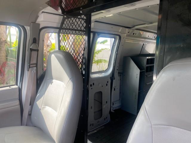 2000 Oxford White /Medium Graphite Ford Econoline Cargo Van LOW MILES 68,046 (1FTRE1426YH) with an 4.2L SEFI SPI V6 Engine engine, Automatic transmission, located at 4701 North Dixie Hwy, Pompano Beach, FL, 33064, (954) 422-2889, 26.240938, -80.123474 - OUR WEBPAGE FLORIDACARS1.COM HAS OVER 100 PHOTOS AND FREE CARFAX LINK 2000 FORD E-150 CARGO VAN READY FOR WORK SAFETY DIVIDER - SHELVES- RUBBER MATS - LOOKS AND DRIVES LIKE NEW VIN: 1FTRE1426YHA31518 1 F T R E 1 4 2 6 Y H A 3 1 5 1 8 VAN 4.2L V6 F SOHC GASOLINE 19 MPG REAR WHEEL DRIVE Features ABS B - Photo#67