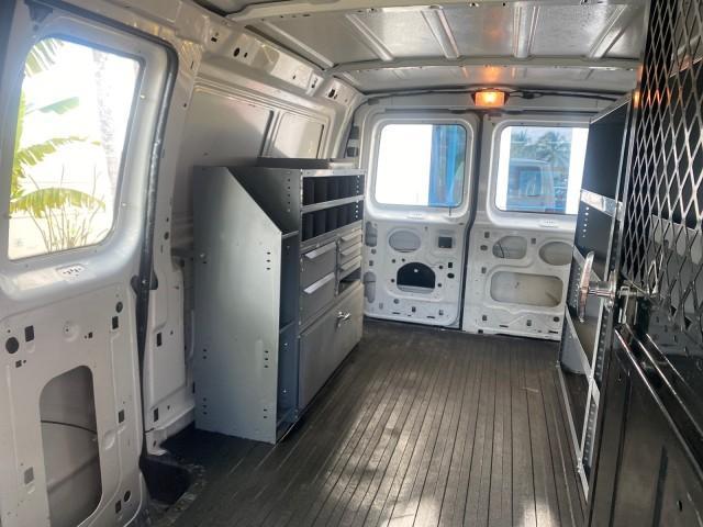 2000 Oxford White /Medium Graphite Ford Econoline Cargo Van LOW MILES 68,046 (1FTRE1426YH) with an 4.2L SEFI SPI V6 Engine engine, Automatic transmission, located at 4701 North Dixie Hwy, Pompano Beach, FL, 33064, (954) 422-2889, 26.240938, -80.123474 - OUR WEBPAGE FLORIDACARS1.COM HAS OVER 100 PHOTOS AND FREE CARFAX LINK 2000 FORD E-150 CARGO VAN READY FOR WORK SAFETY DIVIDER - SHELVES- RUBBER MATS - LOOKS AND DRIVES LIKE NEW VIN: 1FTRE1426YHA31518 1 F T R E 1 4 2 6 Y H A 3 1 5 1 8 VAN 4.2L V6 F SOHC GASOLINE 19 MPG REAR WHEEL DRIVE Features ABS B - Photo#69