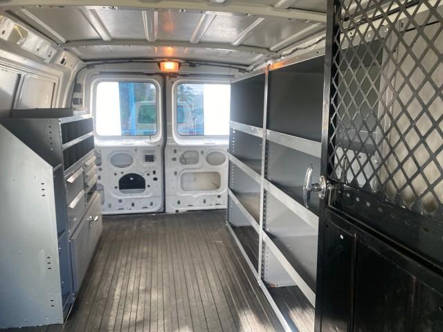 2000 Oxford White /Medium Graphite Ford Econoline Cargo Van LOW MILES 68,046 (1FTRE1426YH) with an 4.2L SEFI SPI V6 Engine engine, Automatic transmission, located at 4701 North Dixie Hwy, Pompano Beach, FL, 33064, (954) 422-2889, 26.240938, -80.123474 - OUR WEBPAGE FLORIDACARS1.COM HAS OVER 100 PHOTOS AND FREE CARFAX LINK 2000 FORD E-150 CARGO VAN READY FOR WORK SAFETY DIVIDER - SHELVES- RUBBER MATS - LOOKS AND DRIVES LIKE NEW VIN: 1FTRE1426YHA31518 1 F T R E 1 4 2 6 Y H A 3 1 5 1 8 VAN 4.2L V6 F SOHC GASOLINE 19 MPG REAR WHEEL DRIVE Features ABS B - Photo#71