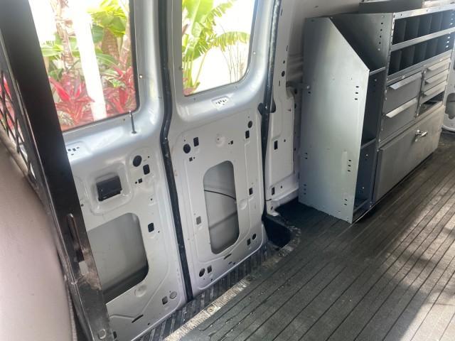 2000 Oxford White /Medium Graphite Ford Econoline Cargo Van LOW MILES 68,046 (1FTRE1426YH) with an 4.2L SEFI SPI V6 Engine engine, Automatic transmission, located at 4701 North Dixie Hwy, Pompano Beach, FL, 33064, (954) 422-2889, 26.240938, -80.123474 - OUR WEBPAGE FLORIDACARS1.COM HAS OVER 100 PHOTOS AND FREE CARFAX LINK 2000 FORD E-150 CARGO VAN READY FOR WORK SAFETY DIVIDER - SHELVES- RUBBER MATS - LOOKS AND DRIVES LIKE NEW VIN: 1FTRE1426YHA31518 1 F T R E 1 4 2 6 Y H A 3 1 5 1 8 VAN 4.2L V6 F SOHC GASOLINE 19 MPG REAR WHEEL DRIVE Features ABS B - Photo#74