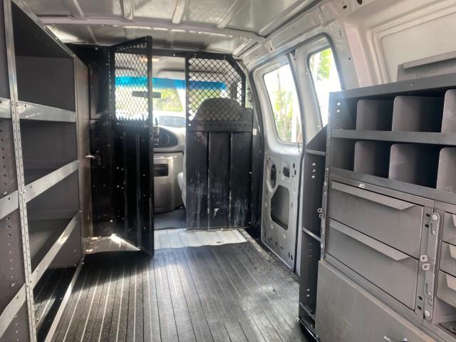 2000 Oxford White /Medium Graphite Ford Econoline Cargo Van LOW MILES 68,046 (1FTRE1426YH) with an 4.2L SEFI SPI V6 Engine engine, Automatic transmission, located at 4701 North Dixie Hwy, Pompano Beach, FL, 33064, (954) 422-2889, 26.240938, -80.123474 - OUR WEBPAGE FLORIDACARS1.COM HAS OVER 100 PHOTOS AND FREE CARFAX LINK 2000 FORD E-150 CARGO VAN READY FOR WORK SAFETY DIVIDER - SHELVES- RUBBER MATS - LOOKS AND DRIVES LIKE NEW VIN: 1FTRE1426YHA31518 1 F T R E 1 4 2 6 Y H A 3 1 5 1 8 VAN 4.2L V6 F SOHC GASOLINE 19 MPG REAR WHEEL DRIVE Features ABS B - Photo#97