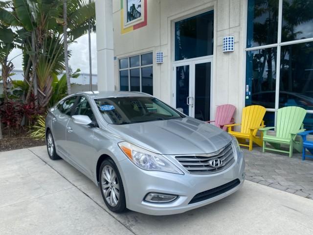 2013 Silver Frost Metallic /Graphite Black Hyundai Azera LOW MILES 12,752 LEATHER LOADED (KMHFG4JG8DA) with an 3.3L DOHC MPI 24-Valve CVVT V6 Engine engine, Automatic transmission, located at 4701 North Dixie Hwy, Pompano Beach, FL, 33064, (954) 422-2889, 26.240938, -80.123474 - OUR WEBPAGE FLORIDACARS1.COM HAS OVER 100 PHOTOS AND FREE CARFAX LINK 2013 HYUNDAI AZERA ONLY 12,752 MILES 1 OF A KIND FIND - $ ORIGINAL PRICE $32,360 VIN: KMHFG4JG8DA228283 K M H F G 4 J G 8 D A 2 2 8 2 8 3 SEDAN 4 DR 3.3L V6 F DOHC 24V GASOLINE 29 MPG FRONT WHEEL DRIVE Features ABS Brakes Air Cond - Photo#1