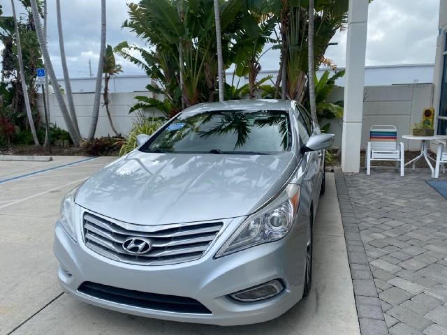 2013 Silver Frost Metallic /Graphite Black Hyundai Azera LOW MILES 12,752 LEATHER LOADED (KMHFG4JG8DA) with an 3.3L DOHC MPI 24-Valve CVVT V6 Engine engine, Automatic transmission, located at 4701 North Dixie Hwy, Pompano Beach, FL, 33064, (954) 422-2889, 26.240938, -80.123474 - OUR WEBPAGE FLORIDACARS1.COM HAS OVER 100 PHOTOS AND FREE CARFAX LINK 2013 HYUNDAI AZERA ONLY 12,752 MILES 1 OF A KIND FIND - $ ORIGINAL PRICE $32,360 VIN: KMHFG4JG8DA228283 K M H F G 4 J G 8 D A 2 2 8 2 8 3 SEDAN 4 DR 3.3L V6 F DOHC 24V GASOLINE 29 MPG FRONT WHEEL DRIVE Features ABS Brakes Air Cond - Photo#3
