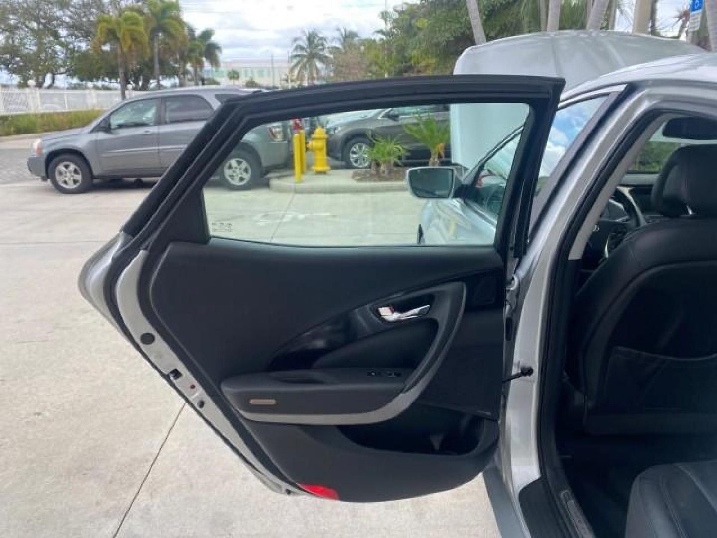 2013 Silver Frost Metallic /Graphite Black Hyundai Azera LOW MILES 12,752 LEATHER LOADED (KMHFG4JG8DA) with an 3.3L DOHC MPI 24-Valve CVVT V6 Engine engine, Automatic transmission, located at 4701 North Dixie Hwy, Pompano Beach, FL, 33064, (954) 422-2889, 26.240938, -80.123474 - OUR WEBPAGE FLORIDACARS1.COM HAS OVER 100 PHOTOS AND FREE CARFAX LINK 2013 HYUNDAI AZERA ONLY 12,752 MILES 1 OF A KIND FIND - $ ORIGINAL PRICE $32,360 VIN: KMHFG4JG8DA228283 K M H F G 4 J G 8 D A 2 2 8 2 8 3 SEDAN 4 DR 3.3L V6 F DOHC 24V GASOLINE 29 MPG FRONT WHEEL DRIVE Features ABS Brakes Air Cond - Photo#13