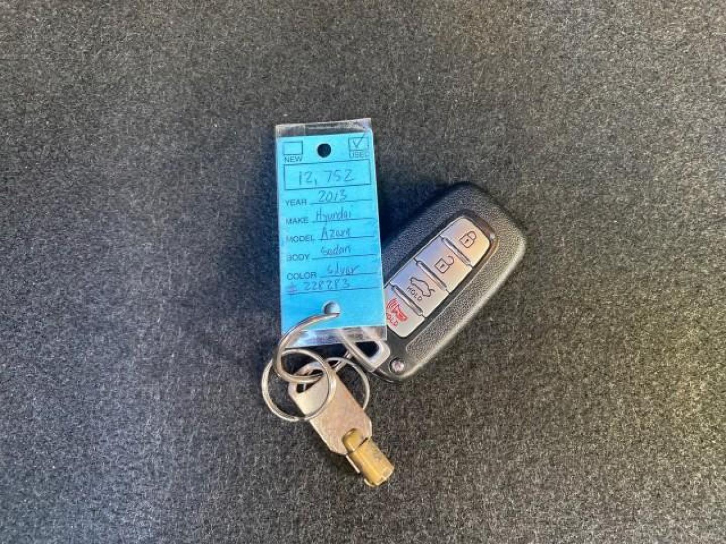 2013 Silver Frost Metallic /Graphite Black Hyundai Azera LOW MILES 12,752 LEATHER LOADED (KMHFG4JG8DA) with an 3.3L DOHC MPI 24-Valve CVVT V6 Engine engine, Automatic transmission, located at 4701 North Dixie Hwy, Pompano Beach, FL, 33064, (954) 422-2889, 26.240938, -80.123474 - OUR WEBPAGE FLORIDACARS1.COM HAS OVER 100 PHOTOS AND FREE CARFAX LINK 2013 HYUNDAI AZERA ONLY 12,752 MILES 1 OF A KIND FIND - $ ORIGINAL PRICE $32,360 VIN: KMHFG4JG8DA228283 K M H F G 4 J G 8 D A 2 2 8 2 8 3 SEDAN 4 DR 3.3L V6 F DOHC 24V GASOLINE 29 MPG FRONT WHEEL DRIVE Features ABS Brakes Air Cond - Photo#23