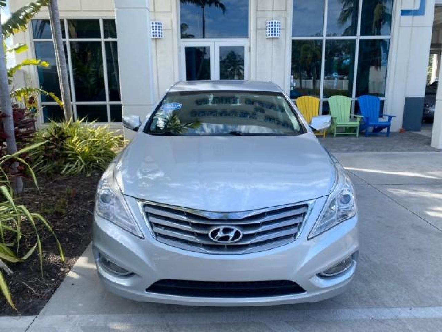 2013 Silver Frost Metallic /Graphite Black Hyundai Azera LOW MILES 12,752 LEATHER LOADED (KMHFG4JG8DA) with an 3.3L DOHC MPI 24-Valve CVVT V6 Engine engine, Automatic transmission, located at 4701 North Dixie Hwy, Pompano Beach, FL, 33064, (954) 422-2889, 26.240938, -80.123474 - OUR WEBPAGE FLORIDACARS1.COM HAS OVER 100 PHOTOS AND FREE CARFAX LINK 2013 HYUNDAI AZERA ONLY 12,752 MILES 1 OF A KIND FIND - $ ORIGINAL PRICE $32,360 VIN: KMHFG4JG8DA228283 K M H F G 4 J G 8 D A 2 2 8 2 8 3 SEDAN 4 DR 3.3L V6 F DOHC 24V GASOLINE 29 MPG FRONT WHEEL DRIVE Features ABS Brakes Air Cond - Photo#27