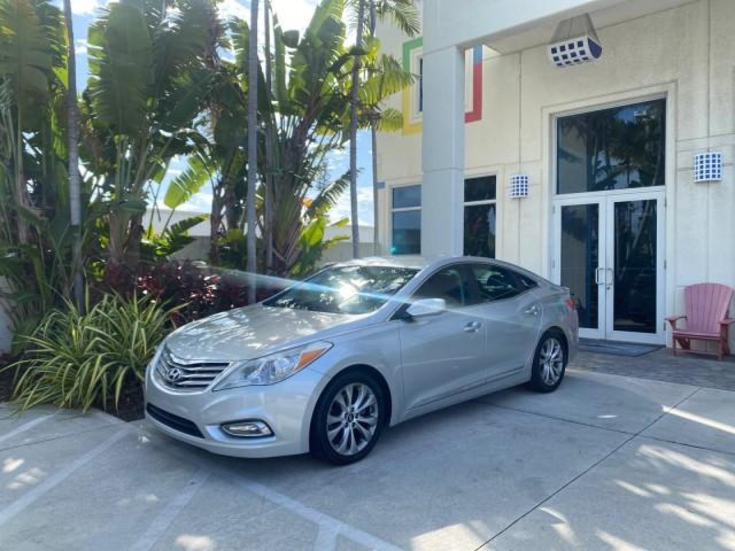 2013 Silver Frost Metallic /Graphite Black Hyundai Azera LOW MILES 12,752 LEATHER LOADED (KMHFG4JG8DA) with an 3.3L DOHC MPI 24-Valve CVVT V6 Engine engine, Automatic transmission, located at 4701 North Dixie Hwy, Pompano Beach, FL, 33064, (954) 422-2889, 26.240938, -80.123474 - OUR WEBPAGE FLORIDACARS1.COM HAS OVER 100 PHOTOS AND FREE CARFAX LINK 2013 HYUNDAI AZERA ONLY 12,752 MILES 1 OF A KIND FIND - $ ORIGINAL PRICE $32,360 VIN: KMHFG4JG8DA228283 K M H F G 4 J G 8 D A 2 2 8 2 8 3 SEDAN 4 DR 3.3L V6 F DOHC 24V GASOLINE 29 MPG FRONT WHEEL DRIVE Features ABS Brakes Air Cond - Photo#28
