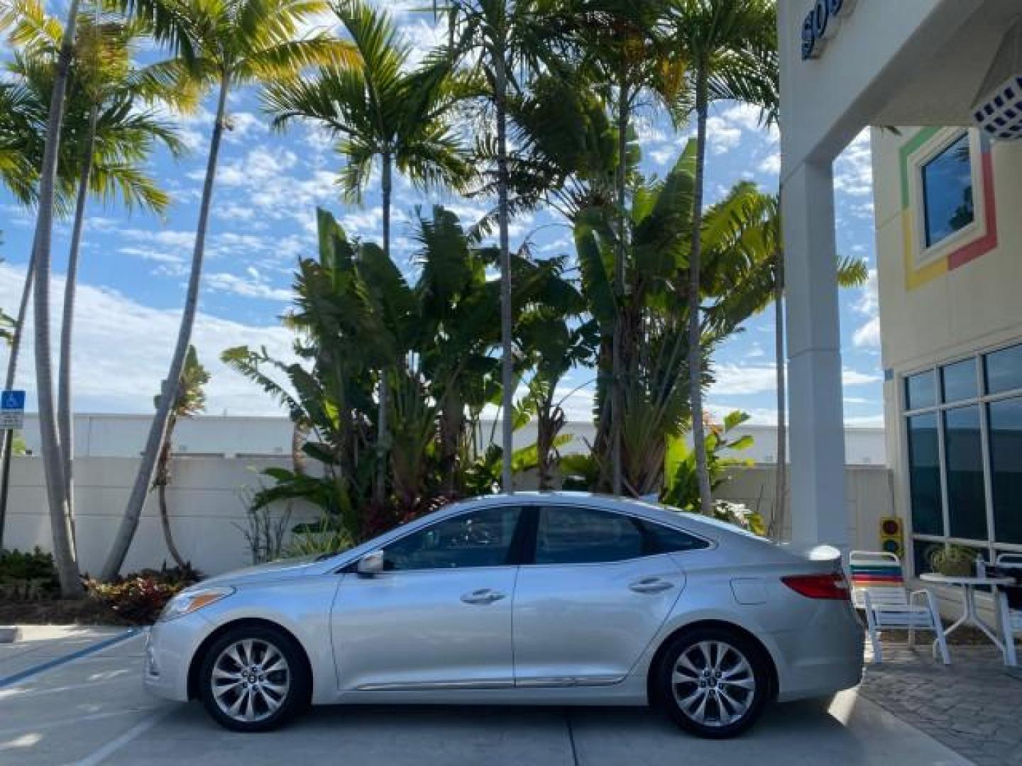 2013 Silver Frost Metallic /Graphite Black Hyundai Azera LOW MILES 12,752 LEATHER LOADED (KMHFG4JG8DA) with an 3.3L DOHC MPI 24-Valve CVVT V6 Engine engine, Automatic transmission, located at 4701 North Dixie Hwy, Pompano Beach, FL, 33064, (954) 422-2889, 26.240938, -80.123474 - OUR WEBPAGE FLORIDACARS1.COM HAS OVER 100 PHOTOS AND FREE CARFAX LINK 2013 HYUNDAI AZERA ONLY 12,752 MILES 1 OF A KIND FIND - $ ORIGINAL PRICE $32,360 VIN: KMHFG4JG8DA228283 K M H F G 4 J G 8 D A 2 2 8 2 8 3 SEDAN 4 DR 3.3L V6 F DOHC 24V GASOLINE 29 MPG FRONT WHEEL DRIVE Features ABS Brakes Air Cond - Photo#30