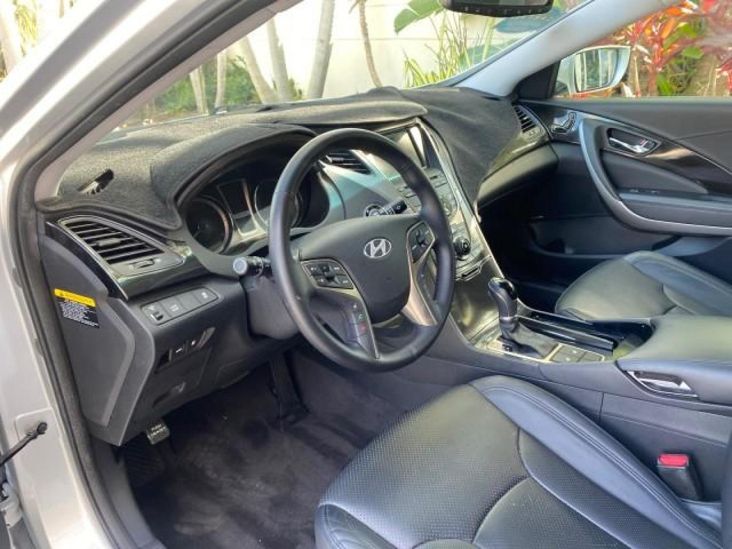 2013 Silver Frost Metallic /Graphite Black Hyundai Azera LOW MILES 12,752 LEATHER LOADED (KMHFG4JG8DA) with an 3.3L DOHC MPI 24-Valve CVVT V6 Engine engine, Automatic transmission, located at 4701 North Dixie Hwy, Pompano Beach, FL, 33064, (954) 422-2889, 26.240938, -80.123474 - OUR WEBPAGE FLORIDACARS1.COM HAS OVER 100 PHOTOS AND FREE CARFAX LINK 2013 HYUNDAI AZERA ONLY 12,752 MILES 1 OF A KIND FIND - $ ORIGINAL PRICE $32,360 VIN: KMHFG4JG8DA228283 K M H F G 4 J G 8 D A 2 2 8 2 8 3 SEDAN 4 DR 3.3L V6 F DOHC 24V GASOLINE 29 MPG FRONT WHEEL DRIVE Features ABS Brakes Air Cond - Photo#45