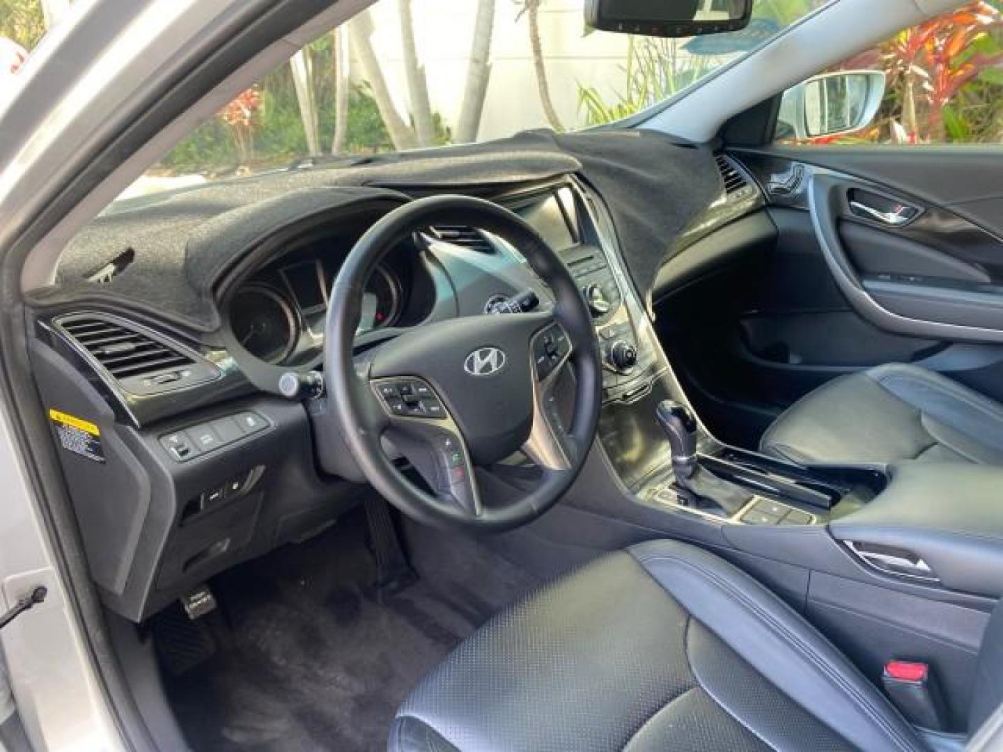 2013 Silver Frost Metallic /Graphite Black Hyundai Azera LOW MILES 12,752 LEATHER LOADED (KMHFG4JG8DA) with an 3.3L DOHC MPI 24-Valve CVVT V6 Engine engine, Automatic transmission, located at 4701 North Dixie Hwy, Pompano Beach, FL, 33064, (954) 422-2889, 26.240938, -80.123474 - OUR WEBPAGE FLORIDACARS1.COM HAS OVER 100 PHOTOS AND FREE CARFAX LINK 2013 HYUNDAI AZERA ONLY 12,752 MILES 1 OF A KIND FIND - $ ORIGINAL PRICE $32,360 VIN: KMHFG4JG8DA228283 K M H F G 4 J G 8 D A 2 2 8 2 8 3 SEDAN 4 DR 3.3L V6 F DOHC 24V GASOLINE 29 MPG FRONT WHEEL DRIVE Features ABS Brakes Air Cond - Photo#46