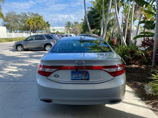 2013 Silver Frost Metallic /Graphite Black Hyundai Azera LOW MILES 12,752 LEATHER LOADED (KMHFG4JG8DA) with an 3.3L DOHC MPI 24-Valve CVVT V6 Engine engine, Automatic transmission, located at 4701 North Dixie Hwy, Pompano Beach, FL, 33064, (954) 422-2889, 26.240938, -80.123474 - OUR WEBPAGE FLORIDACARS1.COM HAS OVER 100 PHOTOS AND FREE CARFAX LINK 2013 HYUNDAI AZERA ONLY 12,752 MILES 1 OF A KIND FIND - $ ORIGINAL PRICE $32,360 VIN: KMHFG4JG8DA228283 K M H F G 4 J G 8 D A 2 2 8 2 8 3 SEDAN 4 DR 3.3L V6 F DOHC 24V GASOLINE 29 MPG FRONT WHEEL DRIVE Features ABS Brakes Air Cond - Photo#93