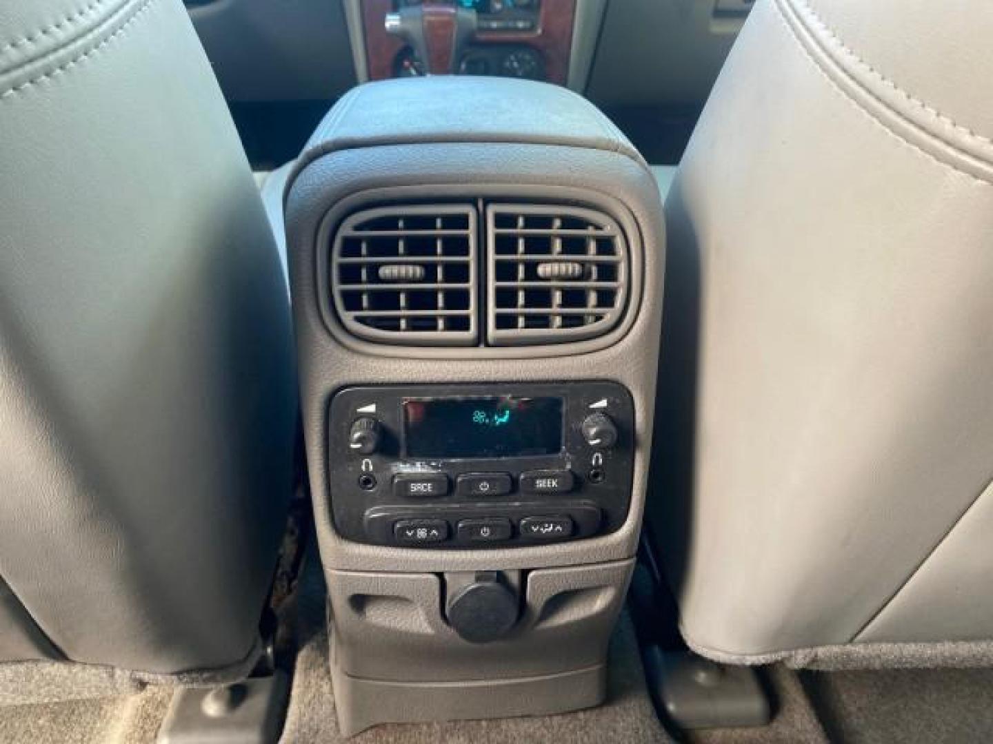 2006 Summit White /Light Gray GMC Envoy Denali LOW MILES 49,532 4WD SUNROOF (1GKET63M862) with an 5.3L Vortec 5300 V8 SFI Engine engine, Automatic transmission, located at 4701 North Dixie Hwy, Pompano Beach, FL, 33064, (954) 422-2889, 26.240938, -80.123474 - OUR WEBPAGE FLORIDACARS1.COM HAS OVER 100 PHOTOS AND FREE CARFAX LINK 2006 GMC ENVOY DENALI 4WD LEATHER LOADED SUNROOF ORIGINAL PRICE $38,600 VIN: 1GKET63M862217425 1 G K E T 6 3 M 8 6 2 2 1 7 4 2 5 4 DOOR WAGON/SPORT UTILITY 5.3L V8 F GASOLINE 21 MPG REAR WHEEL DRIVE W/ 4X4 Features 4WD/AWD ABS Bra - Photo#81