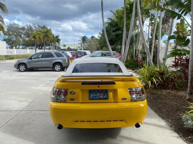 1999 Chrome Yellow /Oxford White Ford Mustang GT LOW MILES 8,145 1 OWNER FL CONV (1FAFP45X3XF) with an 4.6L SOHC SMPI V8 Engine engine, Automatic transmission, located at 4701 North Dixie Hwy, Pompano Beach, FL, 33064, (954) 422-2889, 26.240938, -80.123474 - OUR WEBPAGE FLORIDACARS1.COM HAS OVER 100 PHOTOS AND FREE CARFAX LINK 1999 FORD MUSTANG GT 1 OWNER VIN: 1FAFP45X3XF127745 1 F A F P 4 5 X 3 X F 1 2 7 7 4 5 CONVERTIBLE 4.6L V8 F SOHC 16V GASOLINE 24 MPG REAR WHEEL DRIVE Features ABS Brakes Air Conditioning Alloy Wheels AM/FM Stereo Automatic Transmi - Photo#6