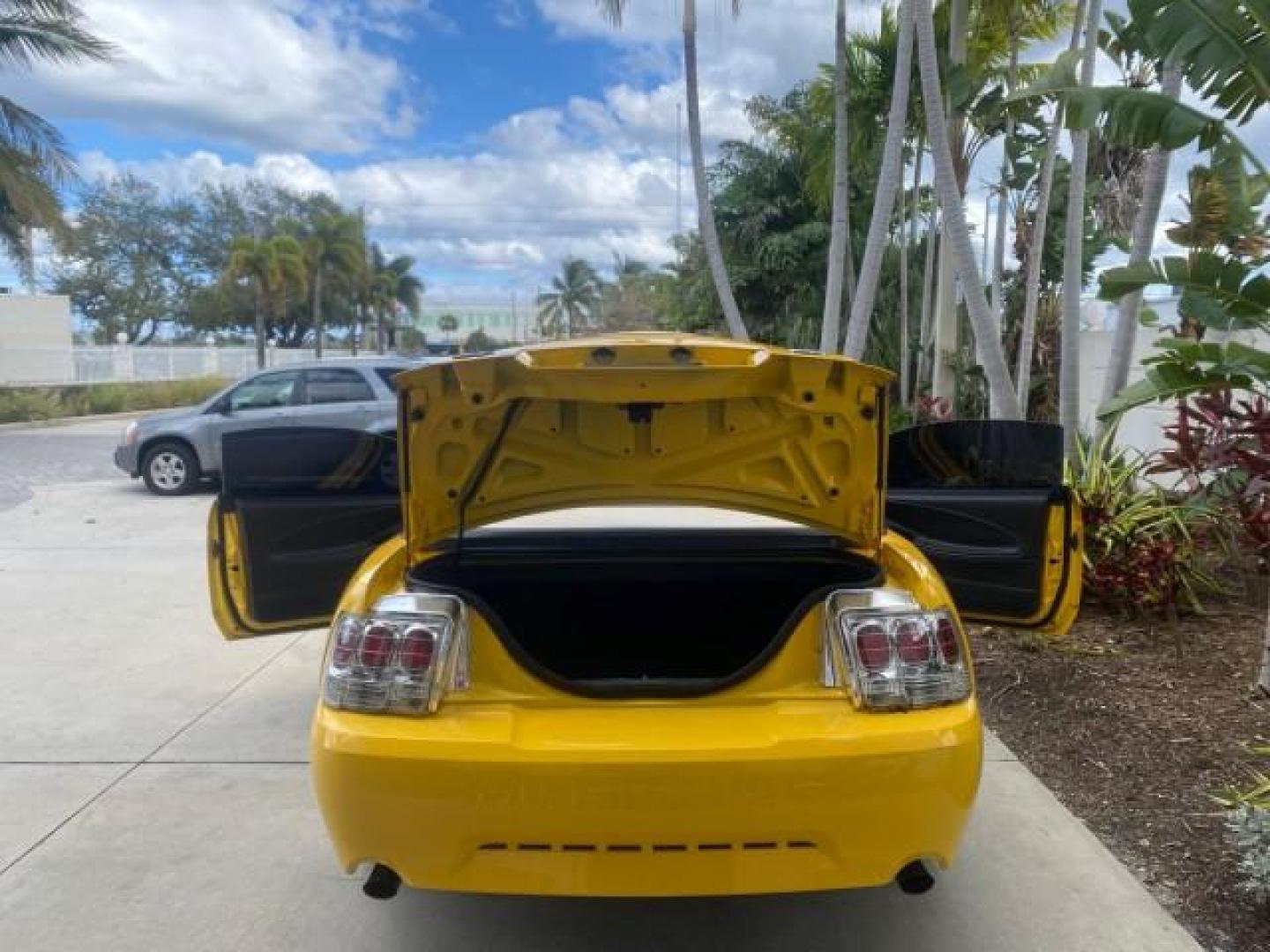 1999 Chrome Yellow /Oxford White Ford Mustang GT LOW MILES 8,145 1 OWNER FL CONV (1FAFP45X3XF) with an 4.6L SOHC SMPI V8 Engine engine, Automatic transmission, located at 4701 North Dixie Hwy, Pompano Beach, FL, 33064, (954) 422-2889, 26.240938, -80.123474 - OUR WEBPAGE FLORIDACARS1.COM HAS OVER 100 PHOTOS AND FREE CARFAX LINK 1999 FORD MUSTANG GT 1 OWNER VIN: 1FAFP45X3XF127745 1 F A F P 4 5 X 3 X F 1 2 7 7 4 5 CONVERTIBLE 4.6L V8 F SOHC 16V GASOLINE 24 MPG REAR WHEEL DRIVE Features ABS Brakes Air Conditioning Alloy Wheels AM/FM Stereo Automatic Transmi - Photo#15