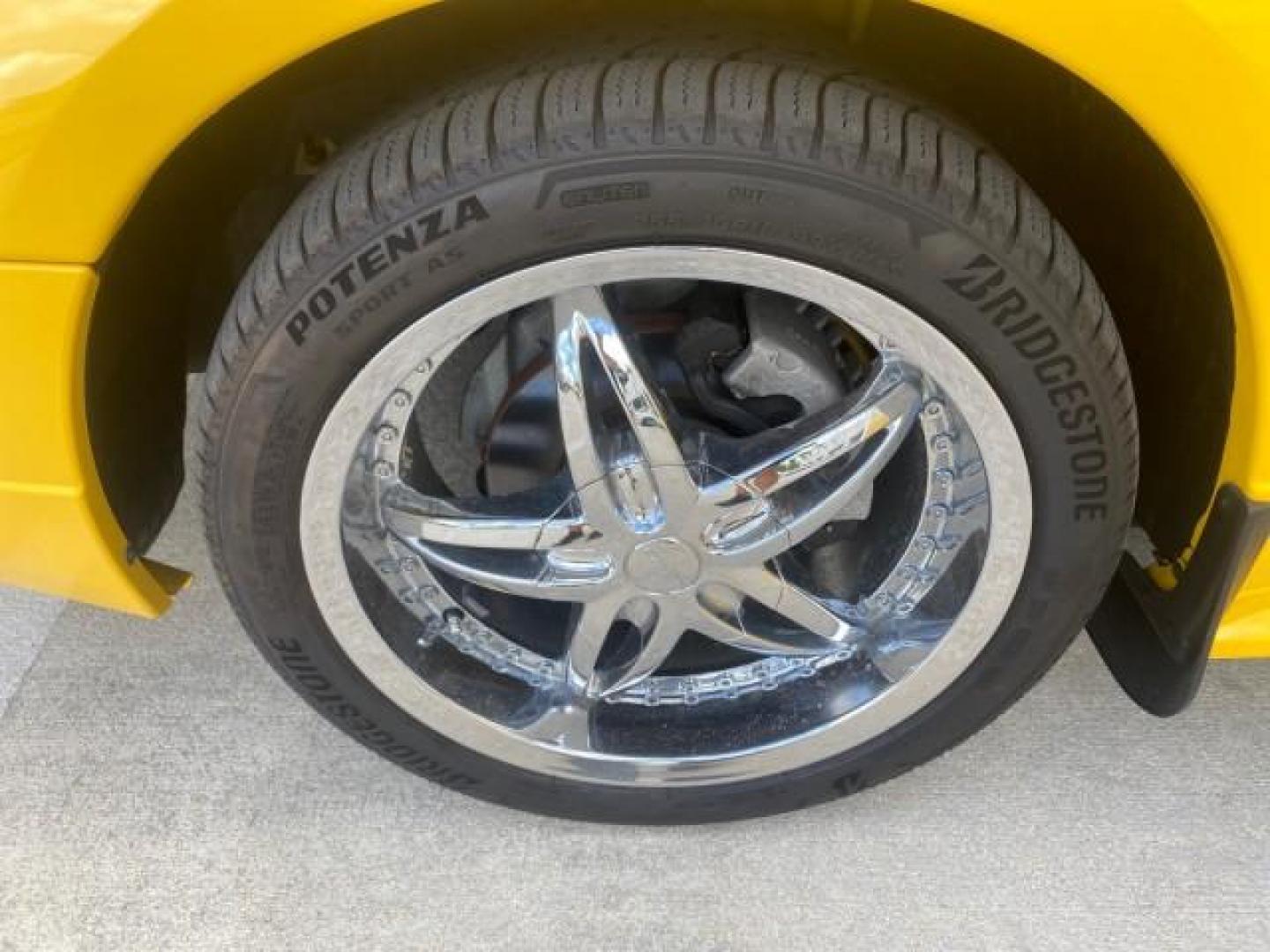 1999 Chrome Yellow /Oxford White Ford Mustang GT LOW MILES 8,145 1 OWNER FL CONV (1FAFP45X3XF) with an 4.6L SOHC SMPI V8 Engine engine, Automatic transmission, located at 4701 North Dixie Hwy, Pompano Beach, FL, 33064, (954) 422-2889, 26.240938, -80.123474 - OUR WEBPAGE FLORIDACARS1.COM HAS OVER 100 PHOTOS AND FREE CARFAX LINK 1999 FORD MUSTANG GT 1 OWNER VIN: 1FAFP45X3XF127745 1 F A F P 4 5 X 3 X F 1 2 7 7 4 5 CONVERTIBLE 4.6L V8 F SOHC 16V GASOLINE 24 MPG REAR WHEEL DRIVE Features ABS Brakes Air Conditioning Alloy Wheels AM/FM Stereo Automatic Transmi - Photo#19